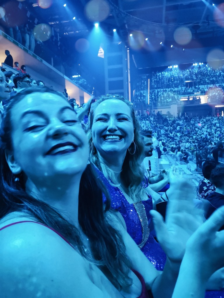 Big smiles on buzzing Laura and Hanna in the audience at Eurovision