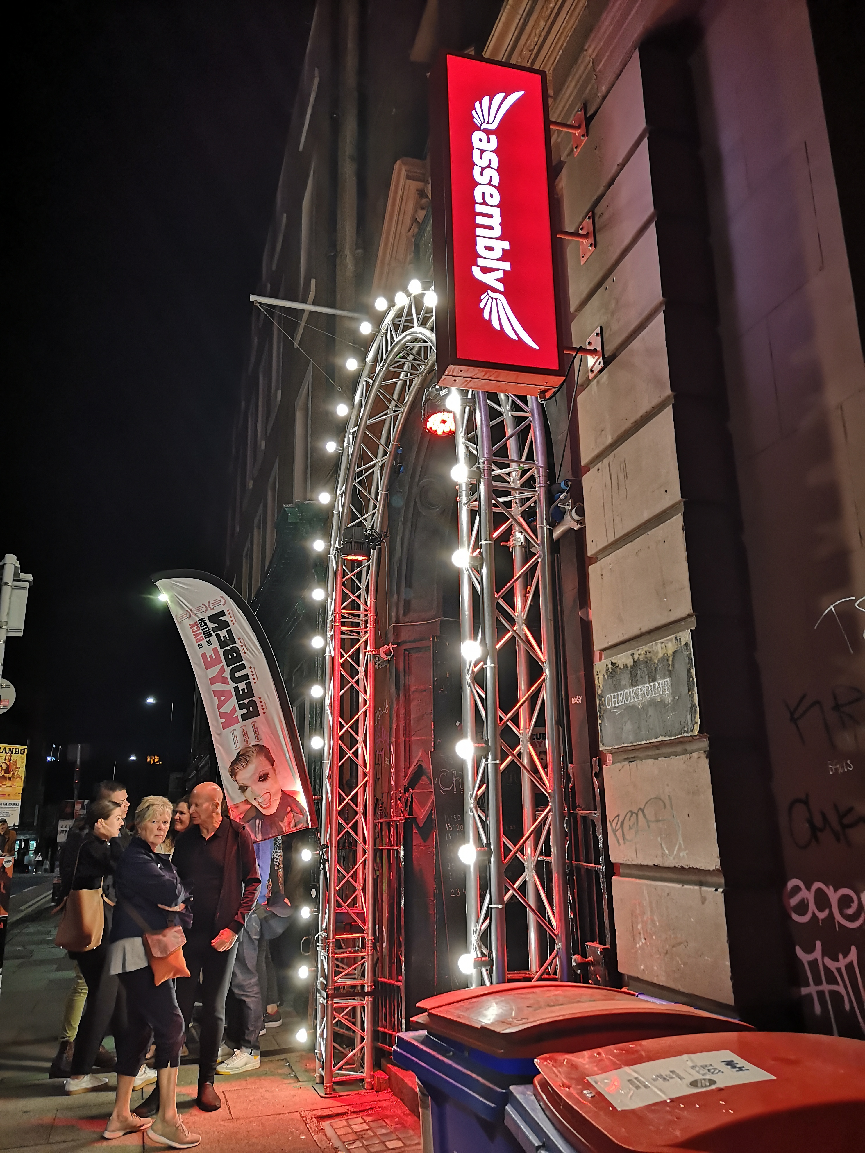 An archway framed with lights