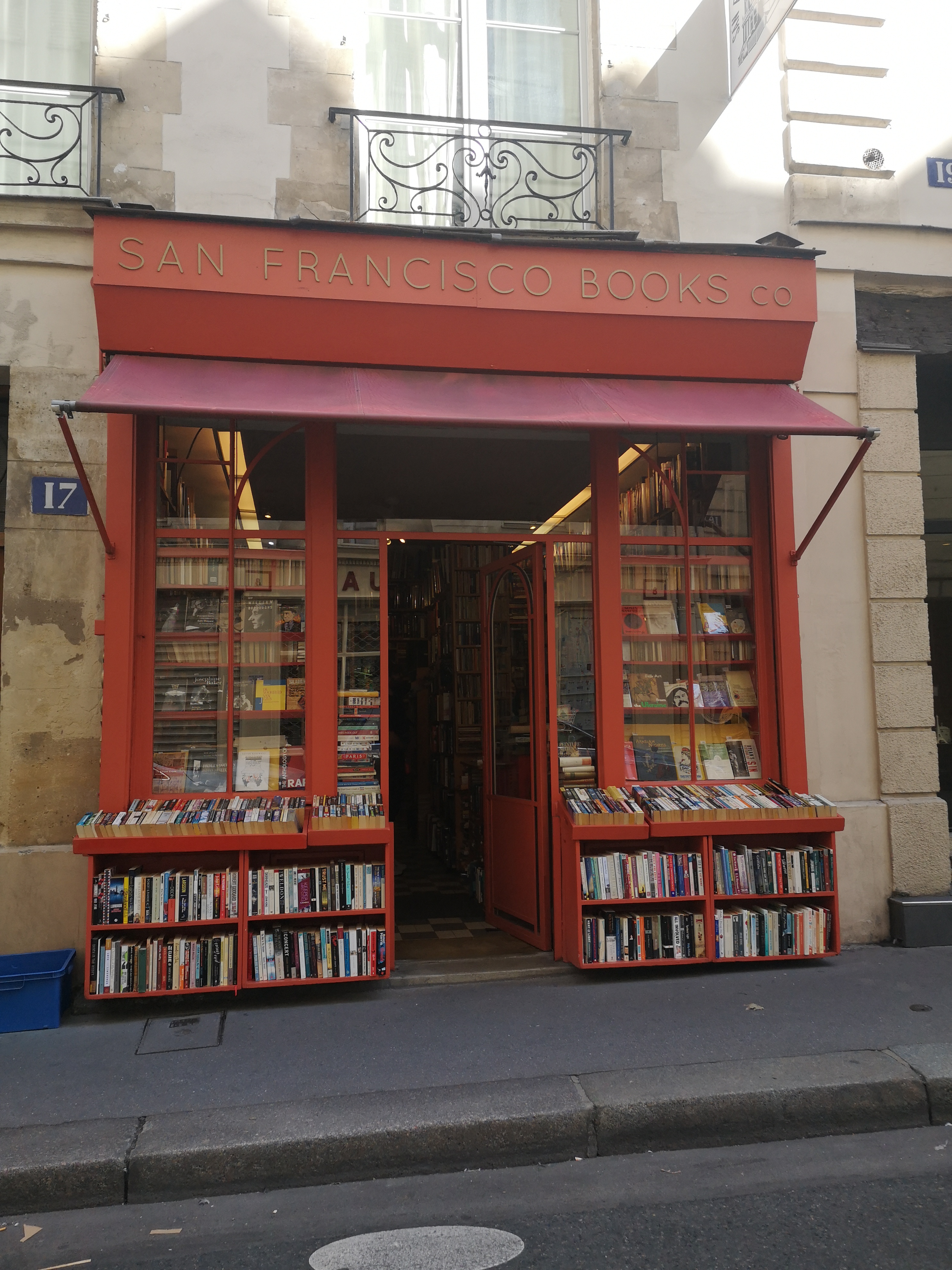 The red shopfront of a bookstore, promising loads of books inside