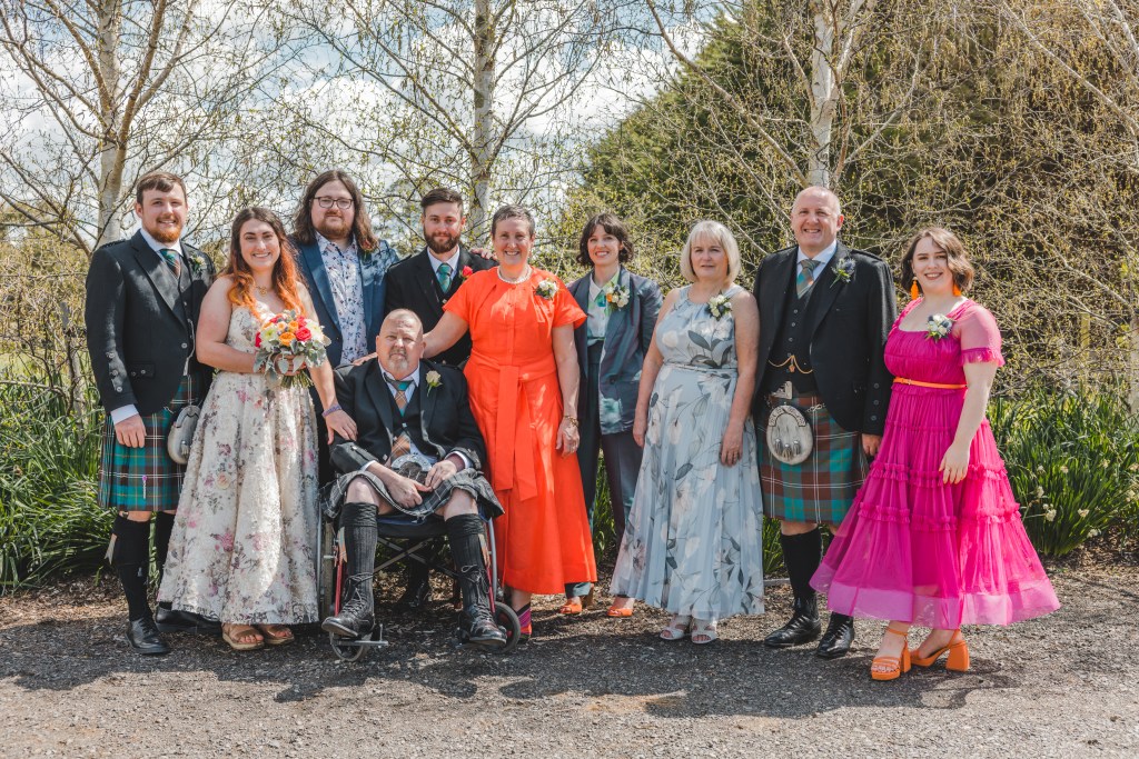 A new family photo with both sides - myself, my parents and brother along with sister-in-law Georgia, her parents and brothers
