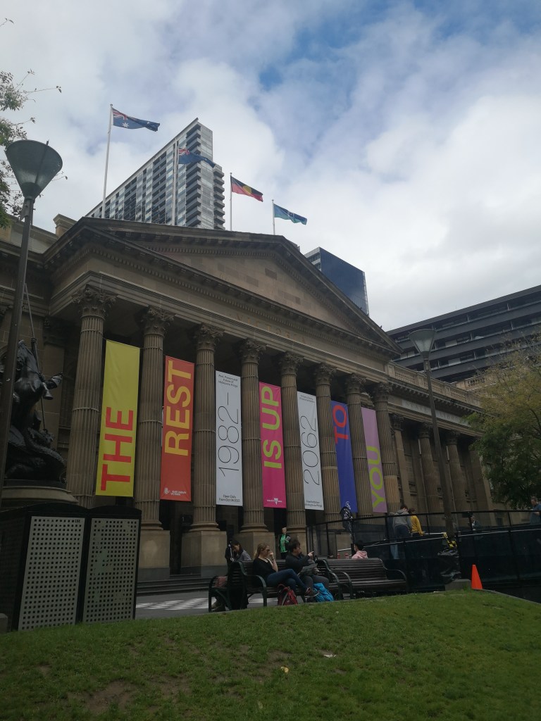 The outside of Victoria State Library, a bit stone building with columns