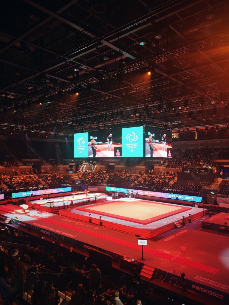 A sports arena set up for women's artistic gymnastics