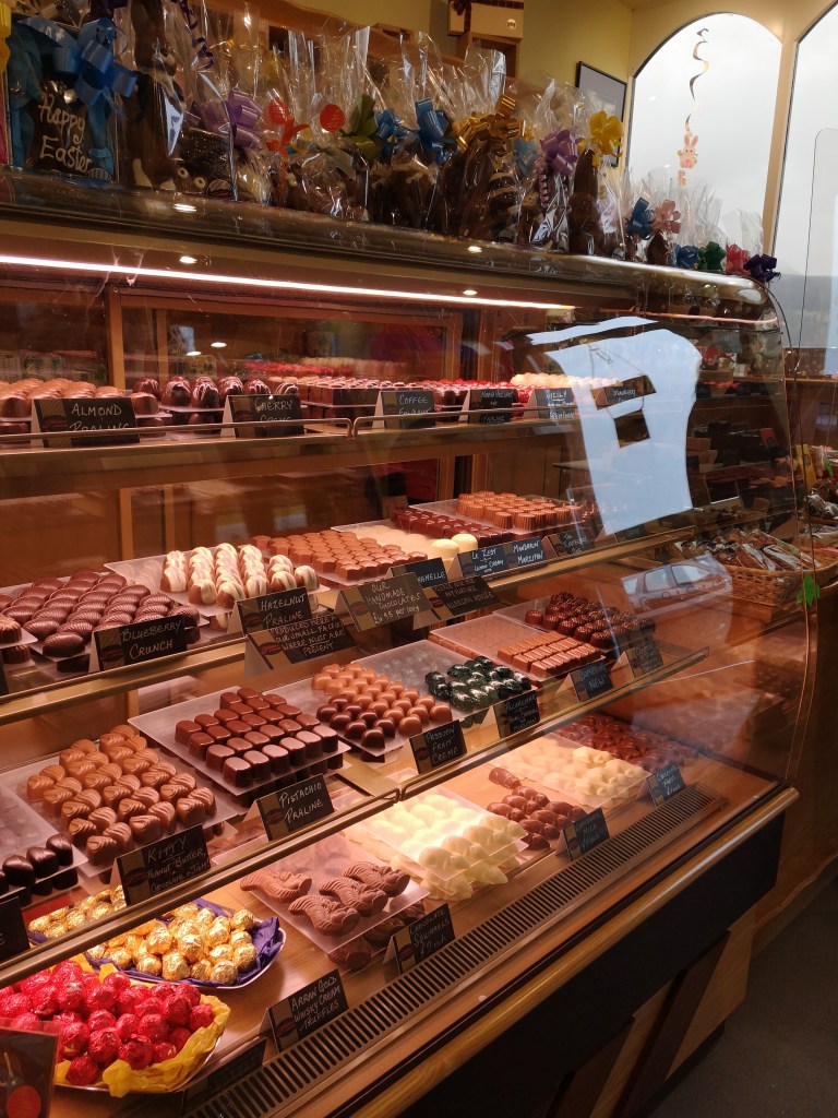 A display case of wee chocolates