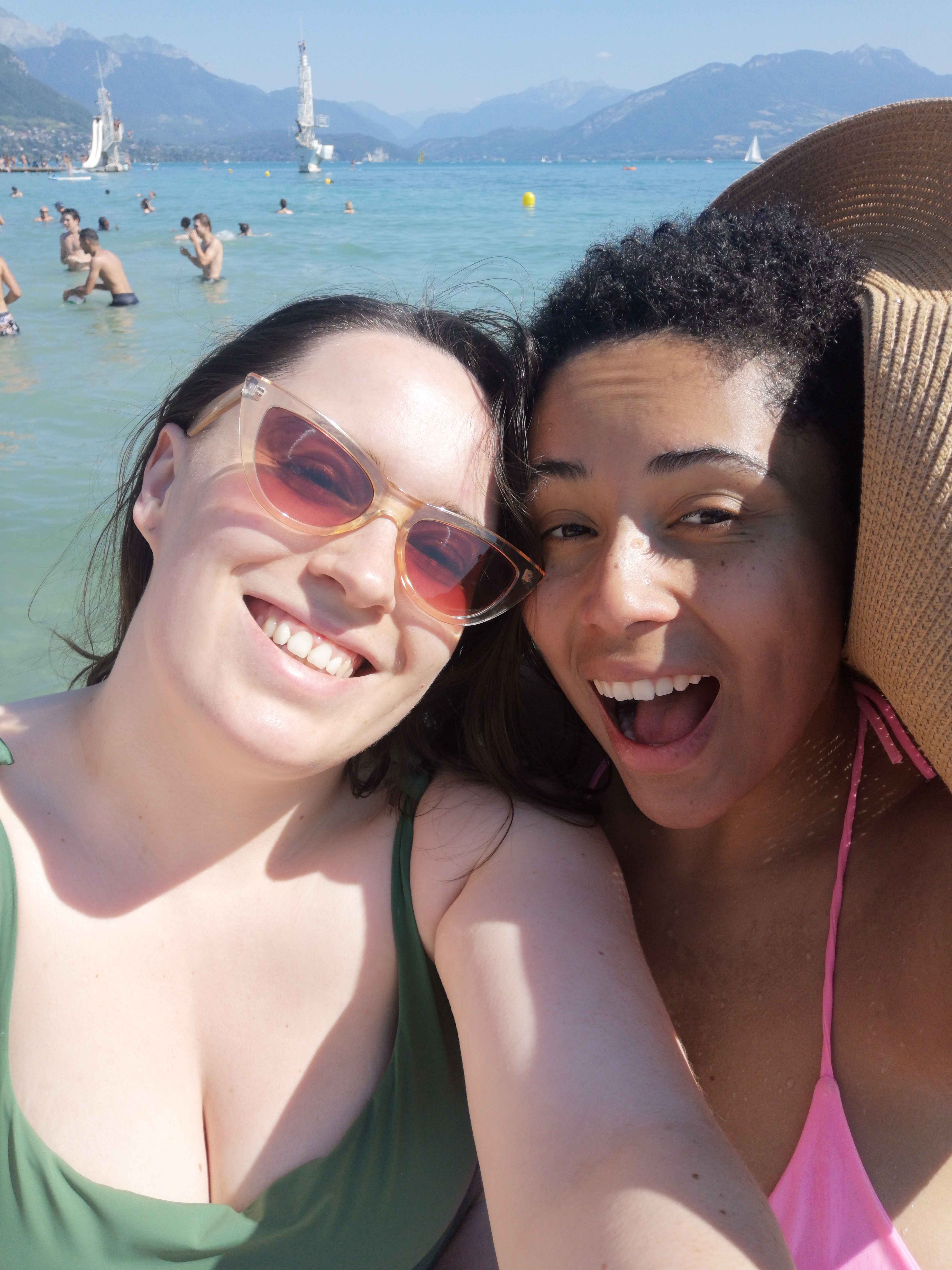 Danielle and I smile together for a selfie in our swimsuits