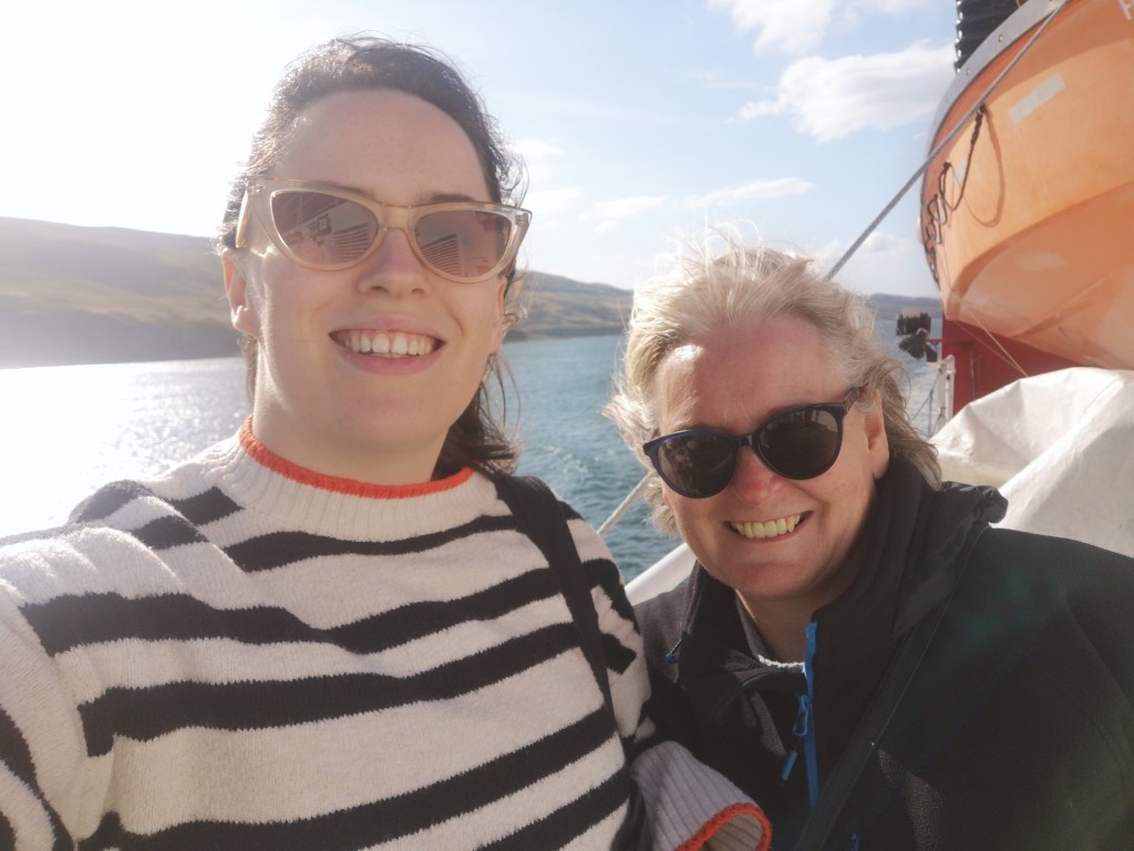 My mum and I smile for a selfie, looking very windswept