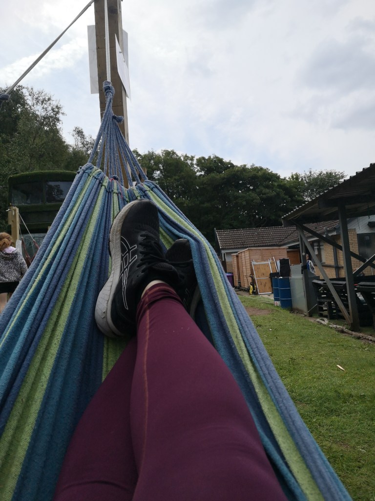My wee legs crossed while lying in a hammock