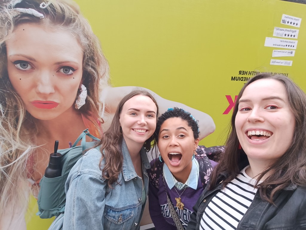 Myself and my two friends smile for a selfie