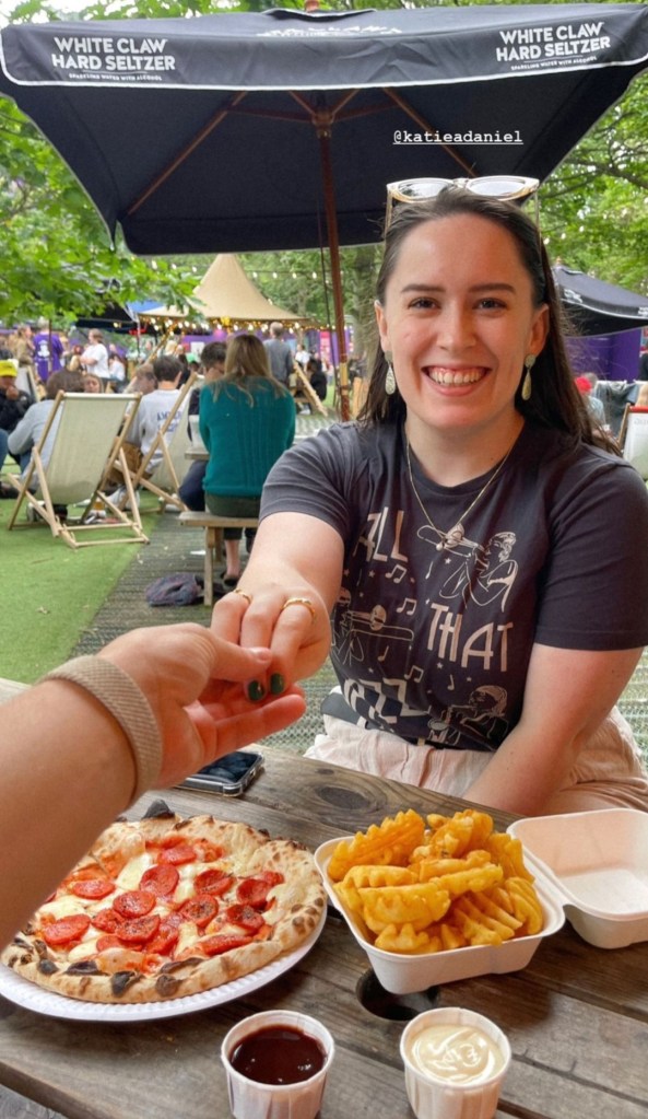 I smile as Ethan holds my hand, our pizza and fries sit on the table