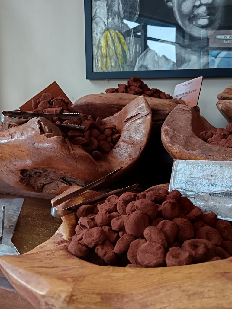Chocolate truffles in wooden bowls