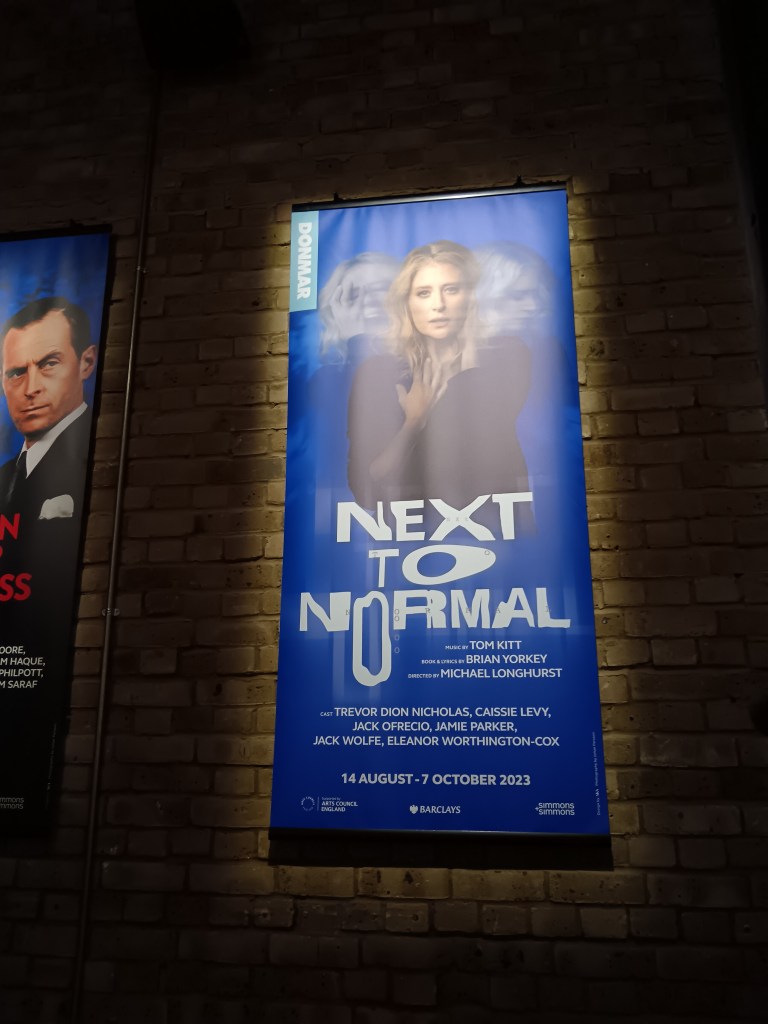 The poster for Next to Normal