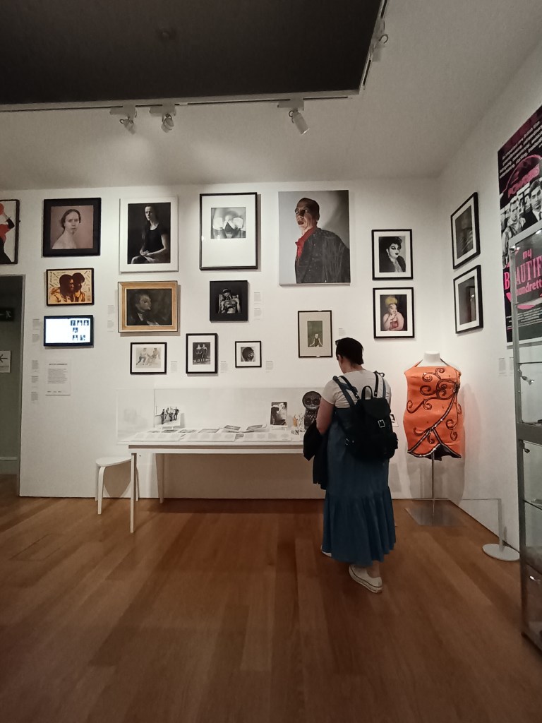 Erin checks out the museum surrounded by queer art