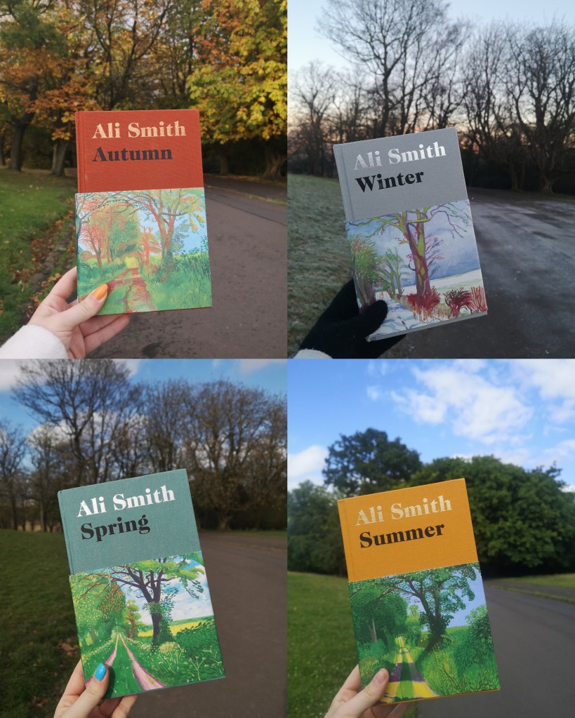 A collage of four images of books about each season held in front of trees which reflect the season