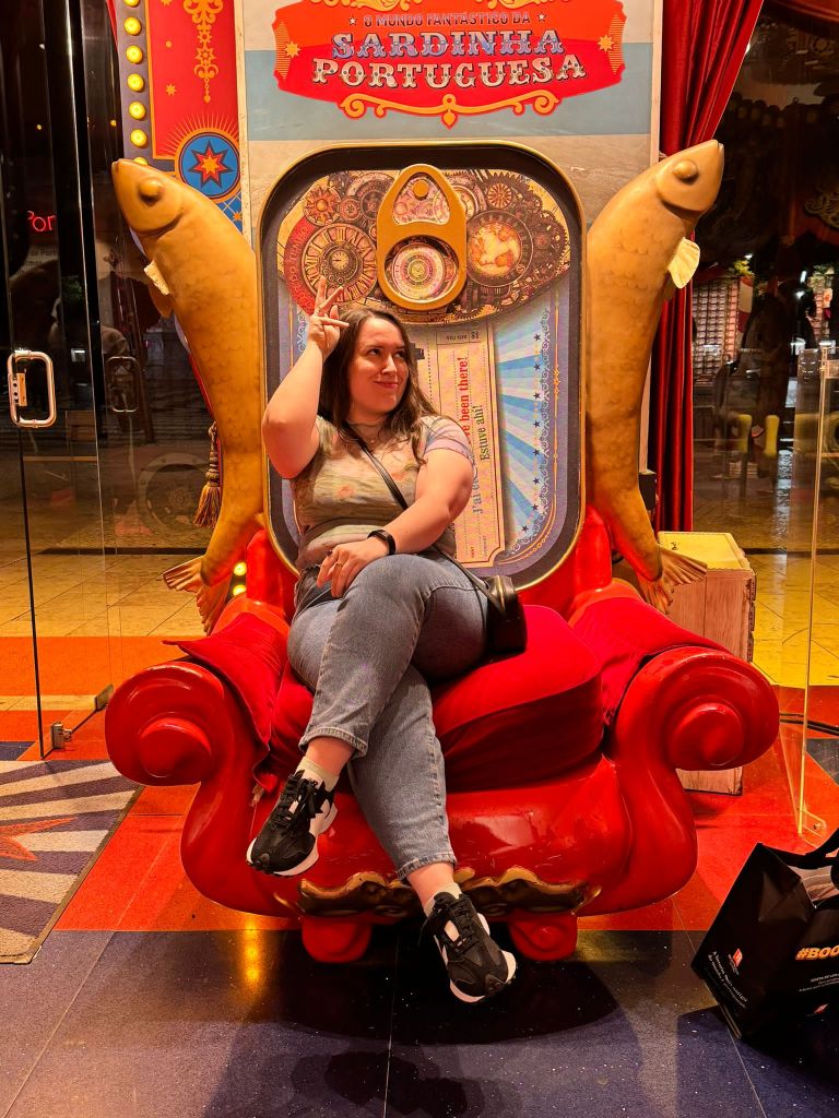 I pose while sat upon a sardine throne