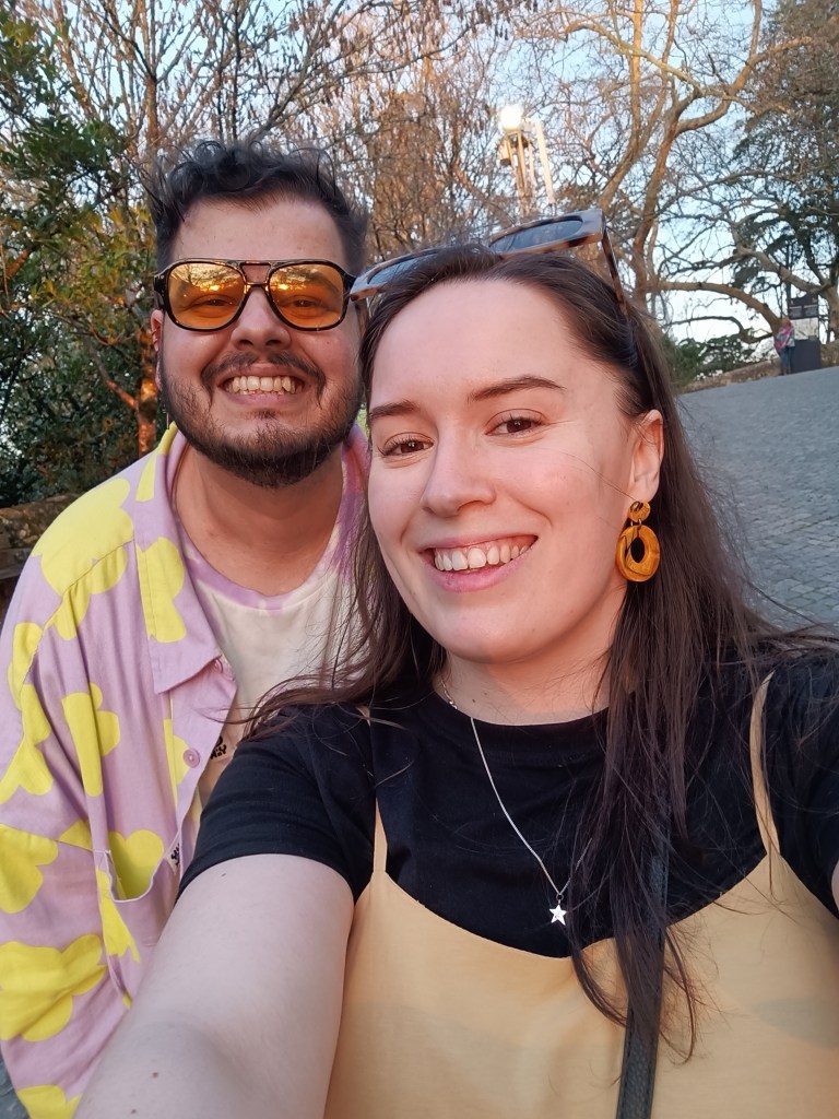 Bruno and I smile for a selfie in the golden hour light