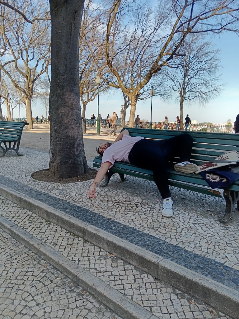 Bruno lies on a bench like he passed out