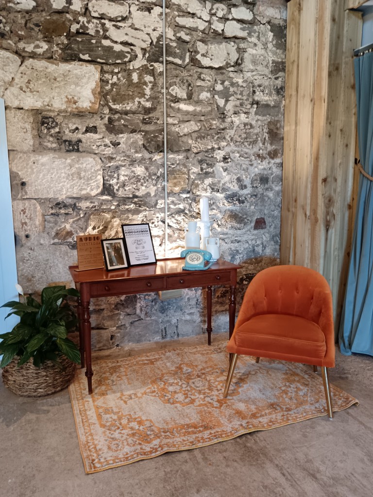 An armchair with an audio guesbook 