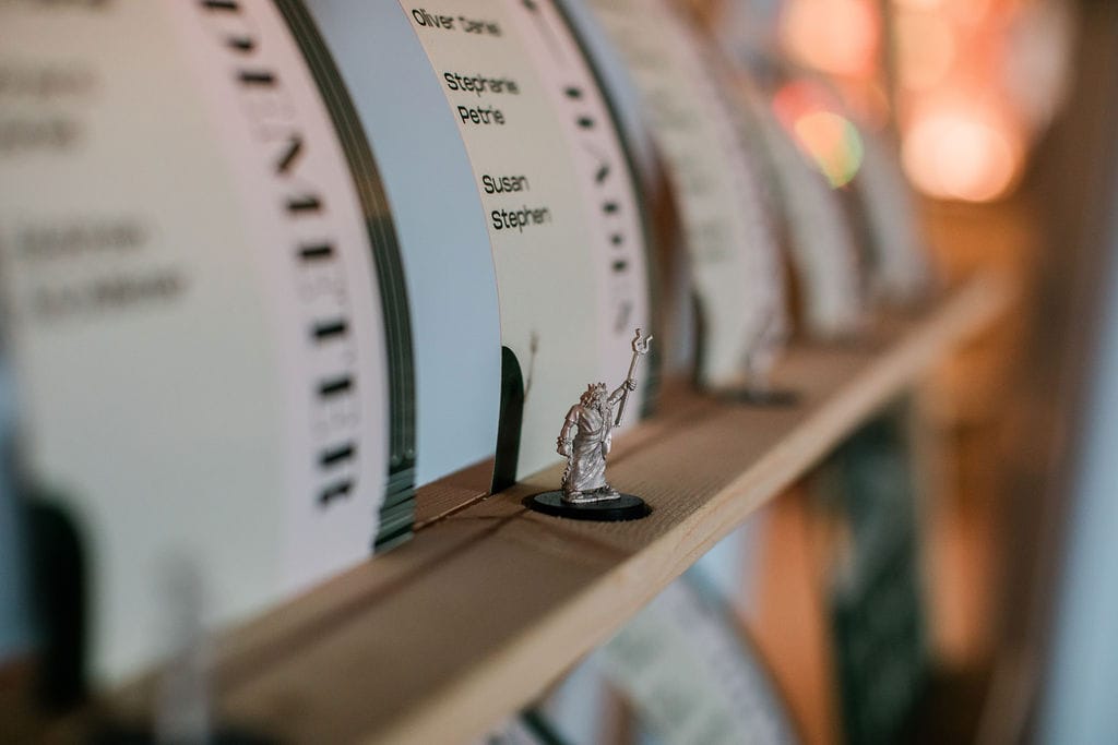 Close up of tiny greek god figurine