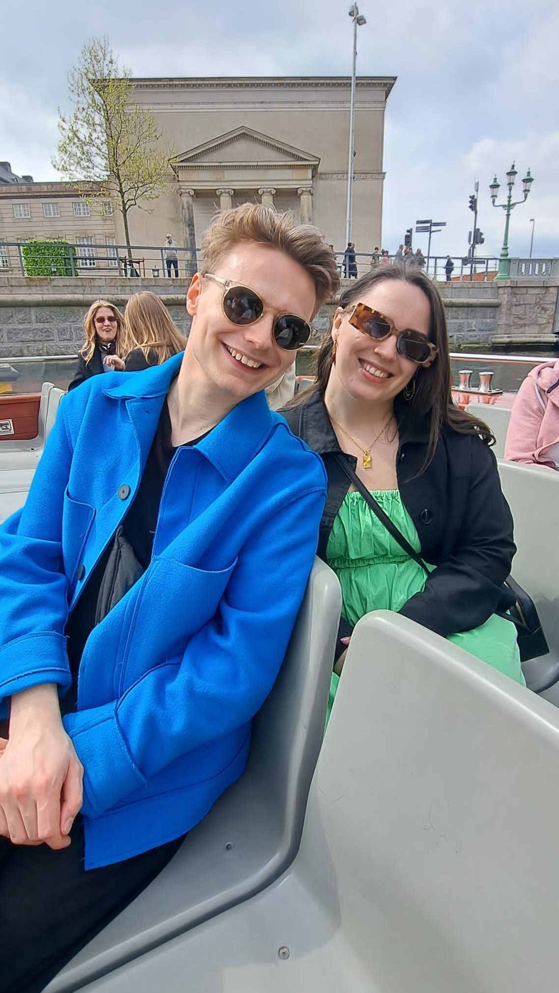 Jack and I sit on the boat smiling