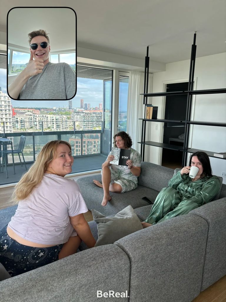 Jack's BeReal of us sitting on the sofa with mugs