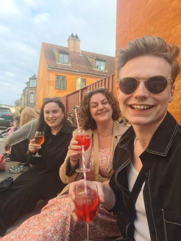 Laura, Jack and I smile with our drinks