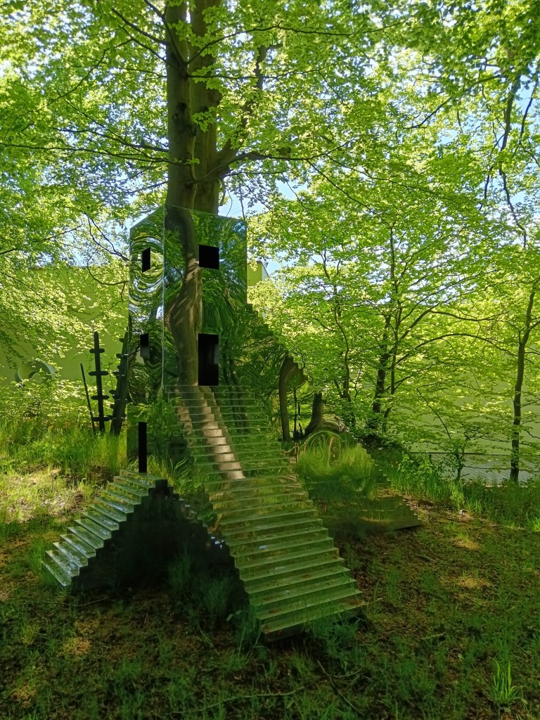 A mirrored staircase in the woods