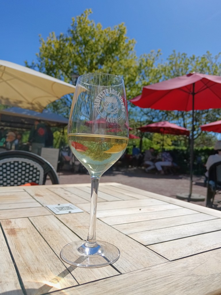 A glass of wine in an outdoor cafe