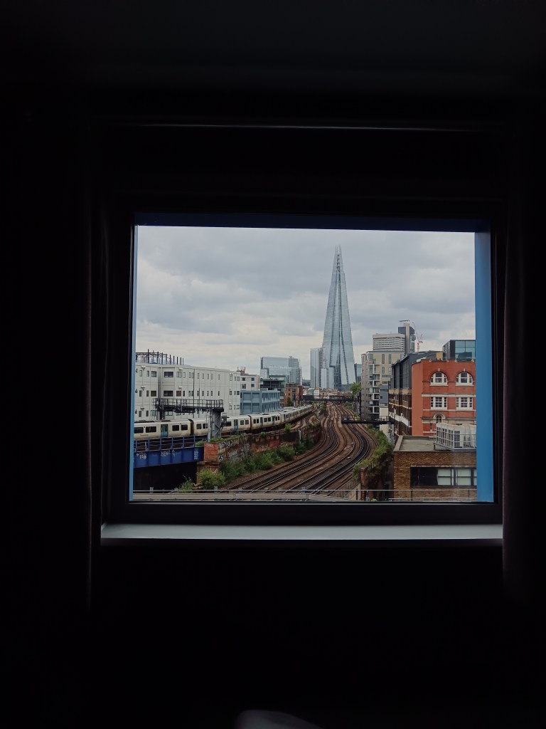 The shard can be seen through a window