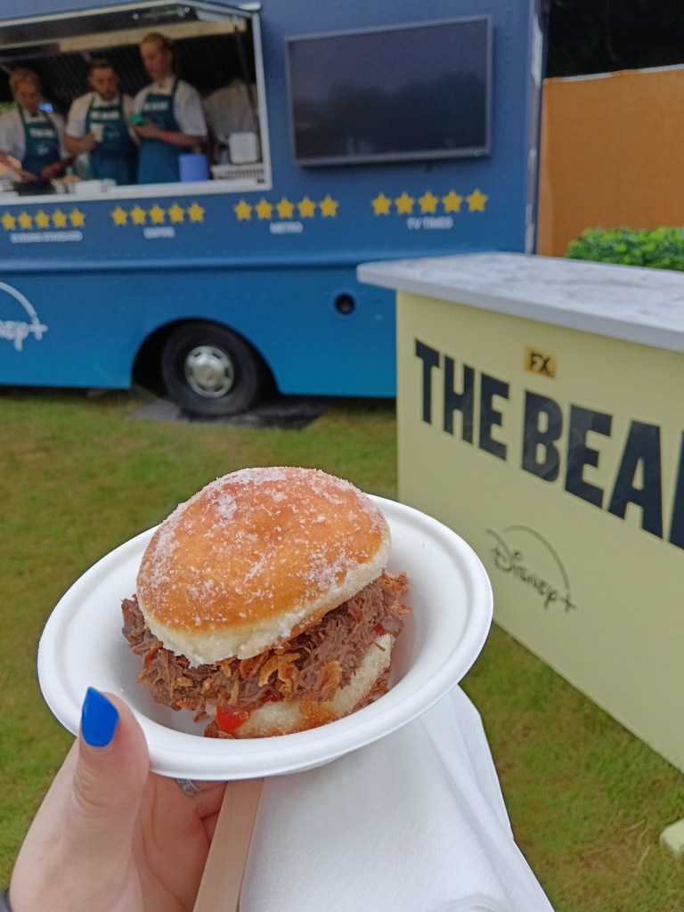 A donut split with brisket inside