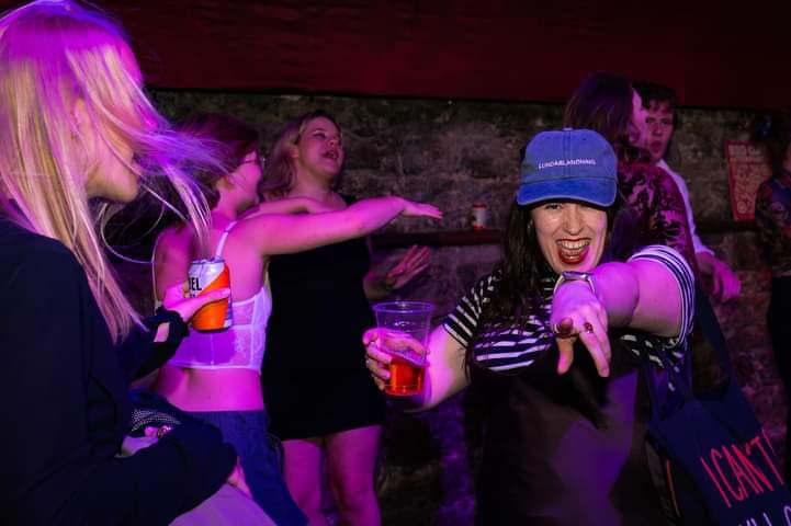 Me, drunk dancing and pointing to Ejay behind the camera