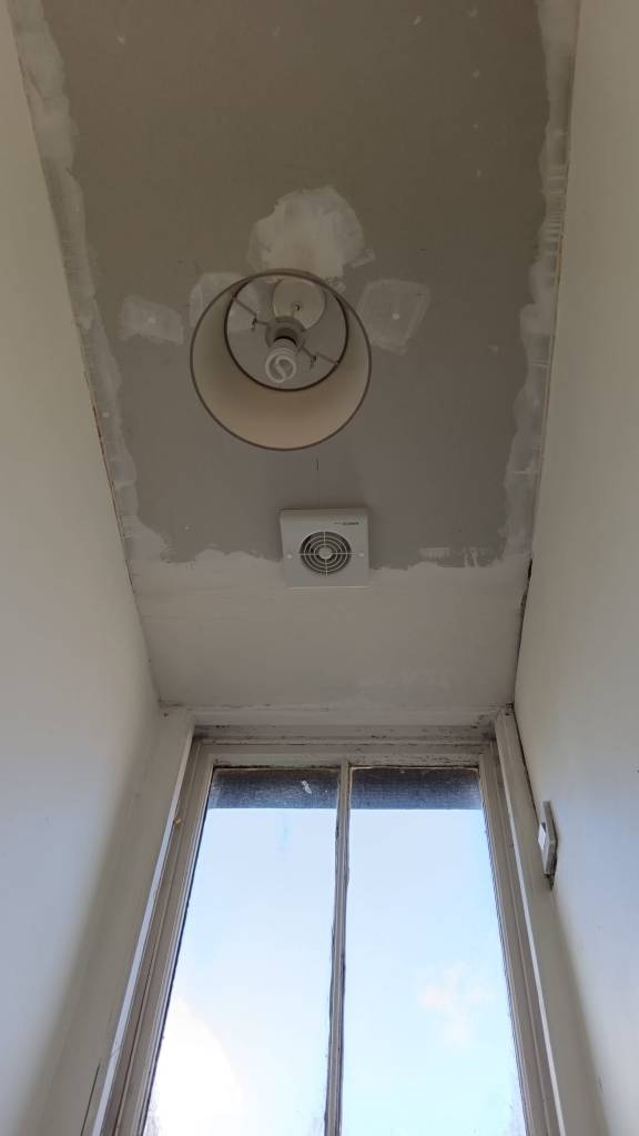 My new raw ceiling after installing an extractor fan