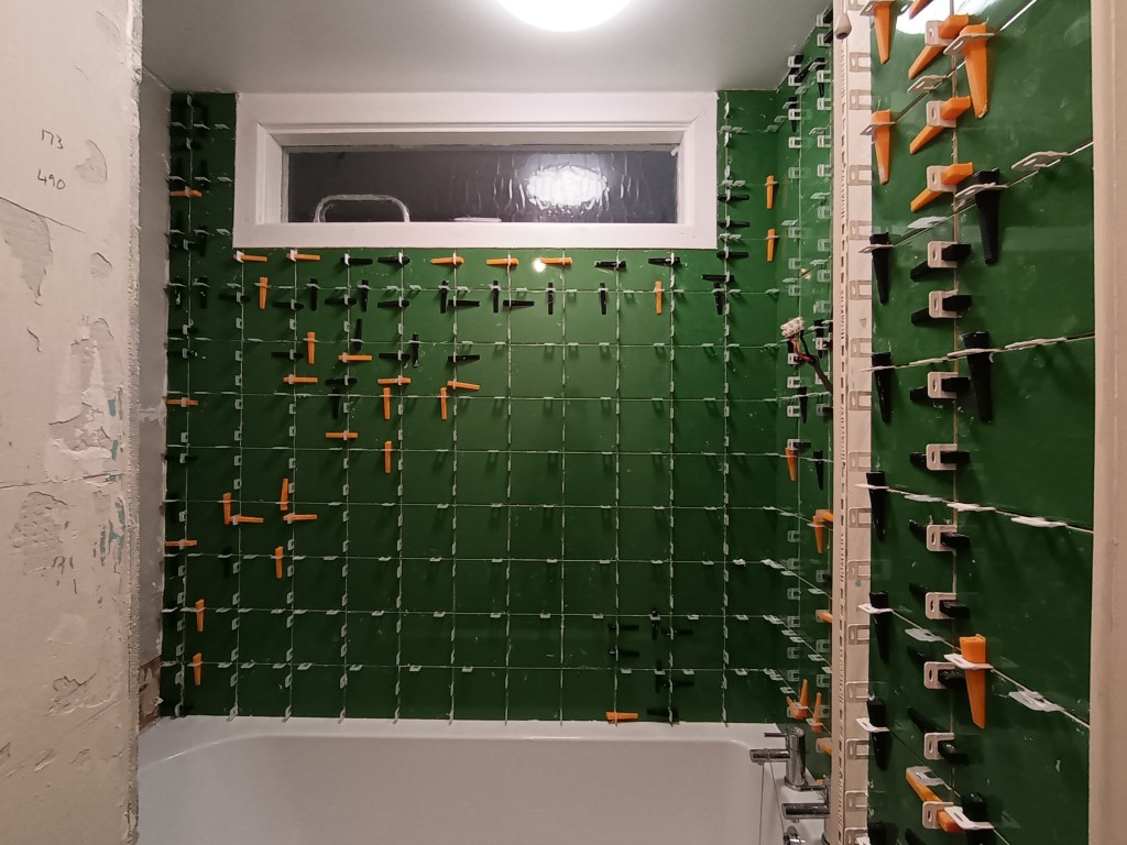 My shower area mid green tiling