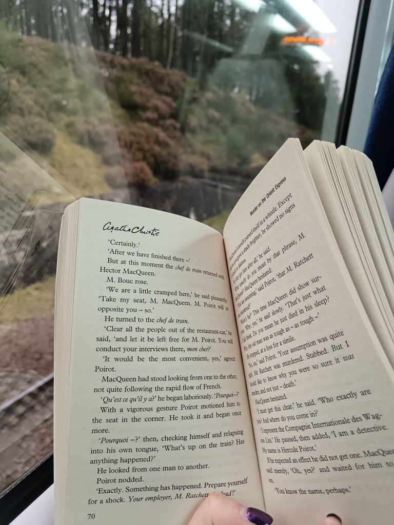 and open book on a train