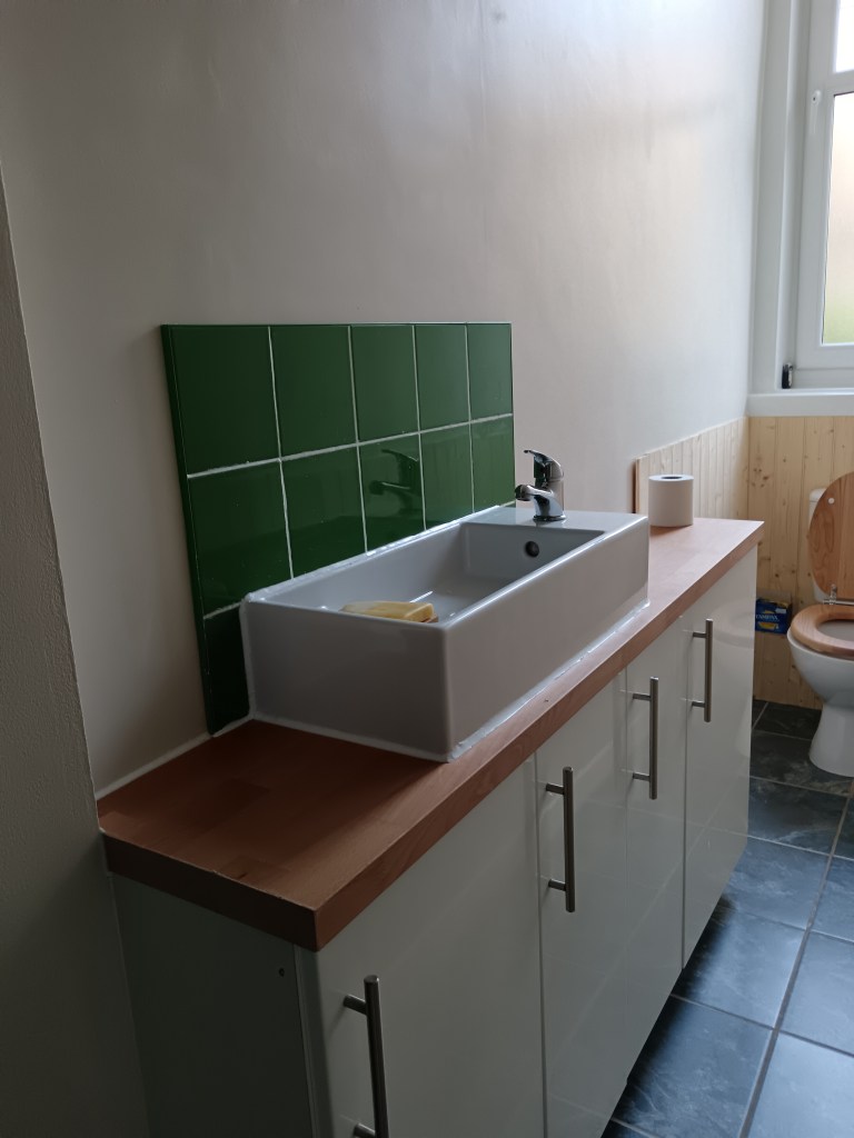 My new countertop and splashback tiles installed