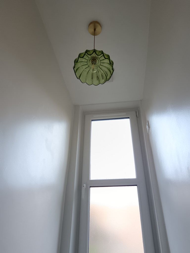 My green glass pendant light and the new window