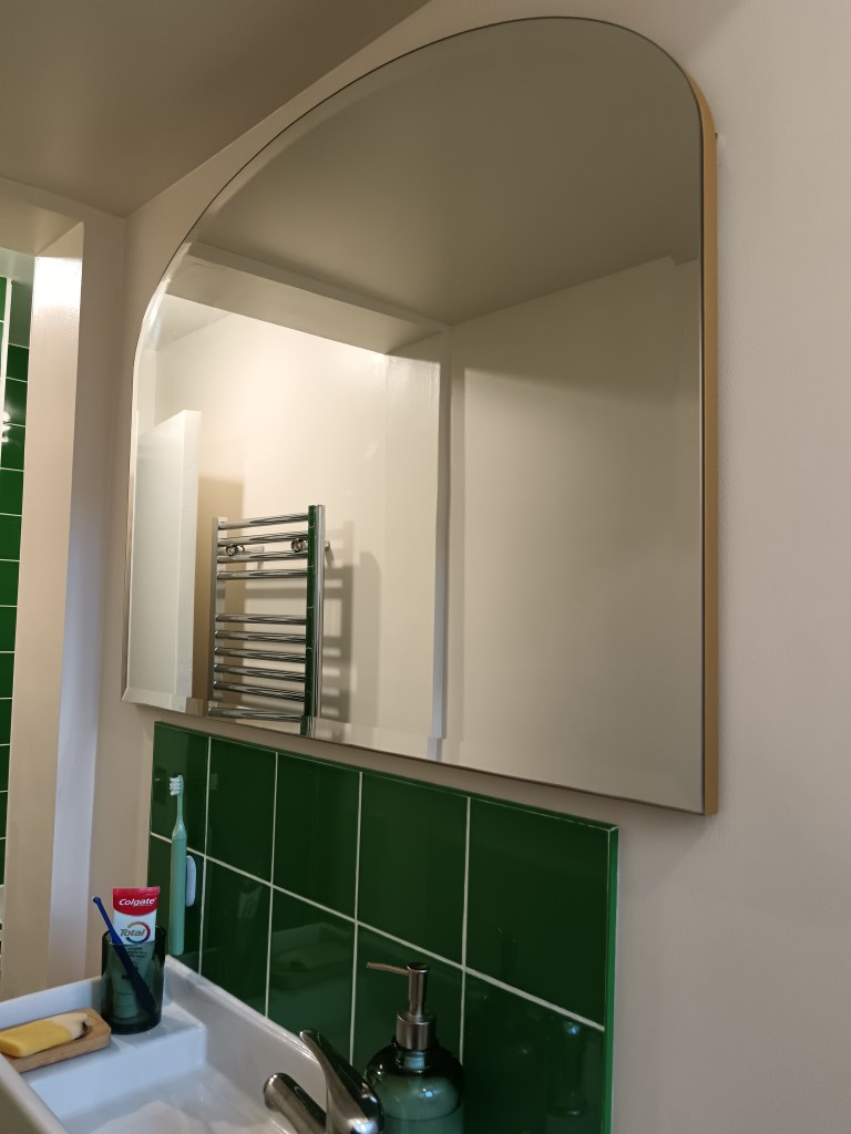 My giant gold mirror over my sink