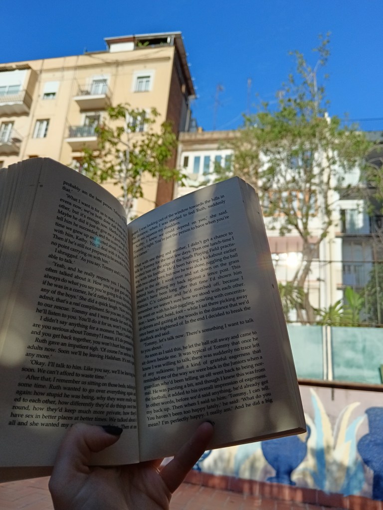 Sunlight dapples on my open book