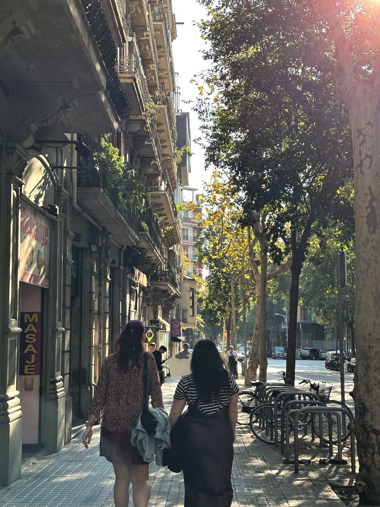 Deby and I walk down Barcelona streets