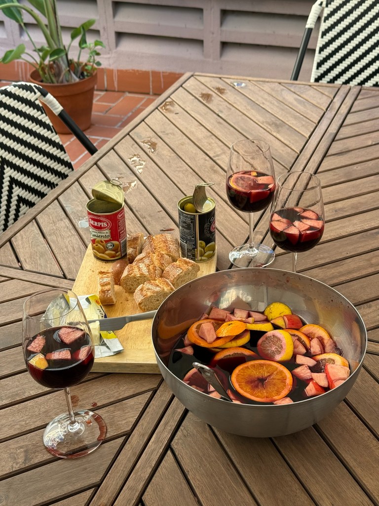 Cut up baguette and sangria on the terrace