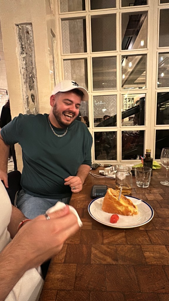 Bruno smiles looking at his cake