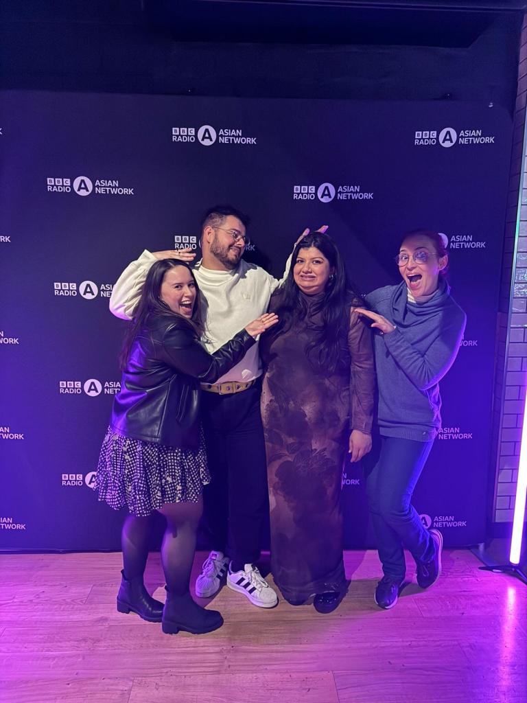 We proudly gesture to star comedian Sabina