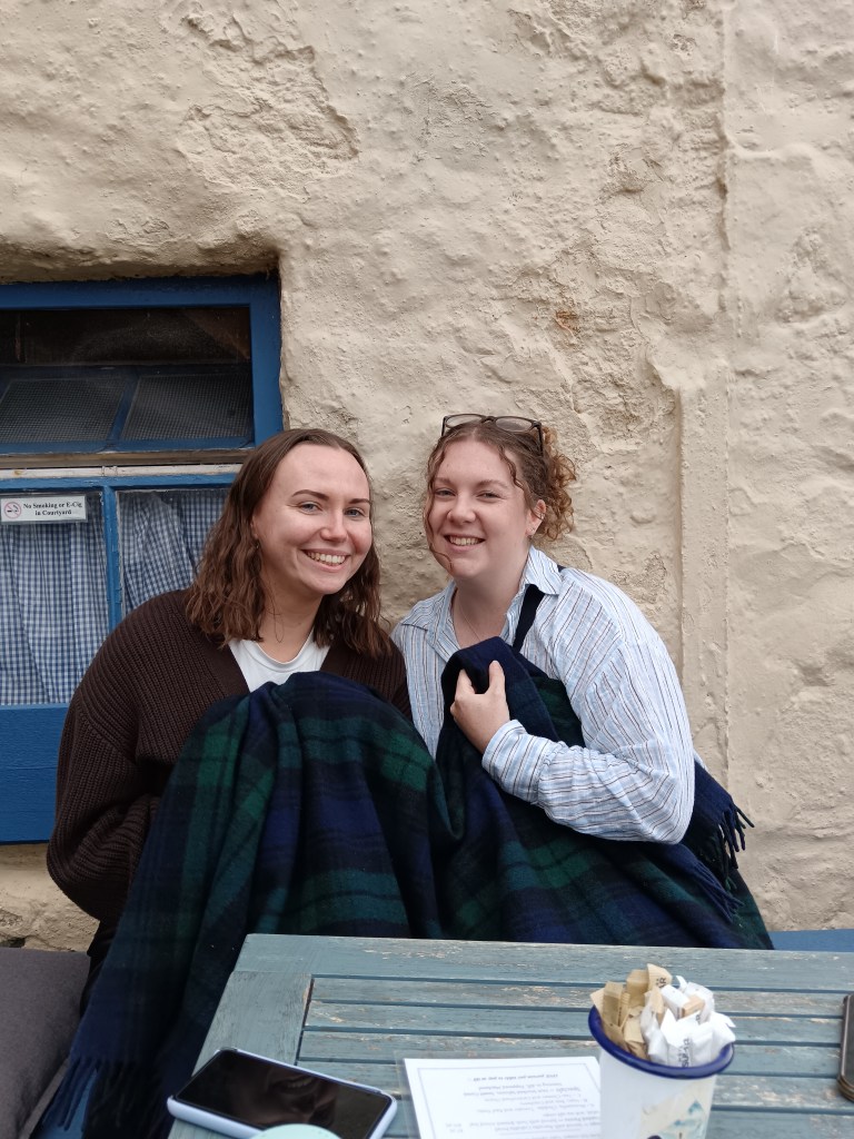 Helen and Hilary cuddle up with a blanket