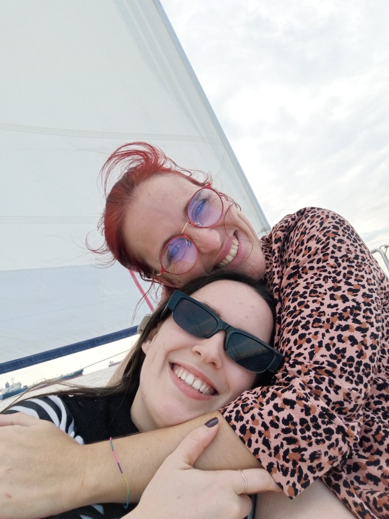 Deby and I hug on a boat