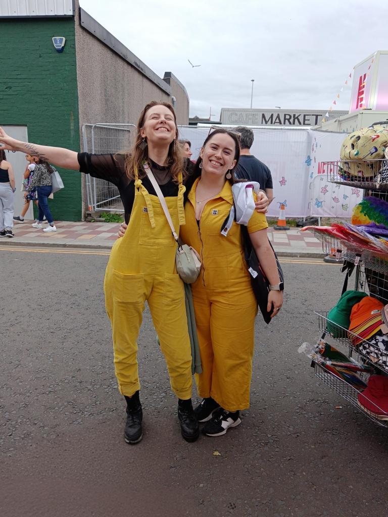 Ejay and I smile in matching yellow outfits