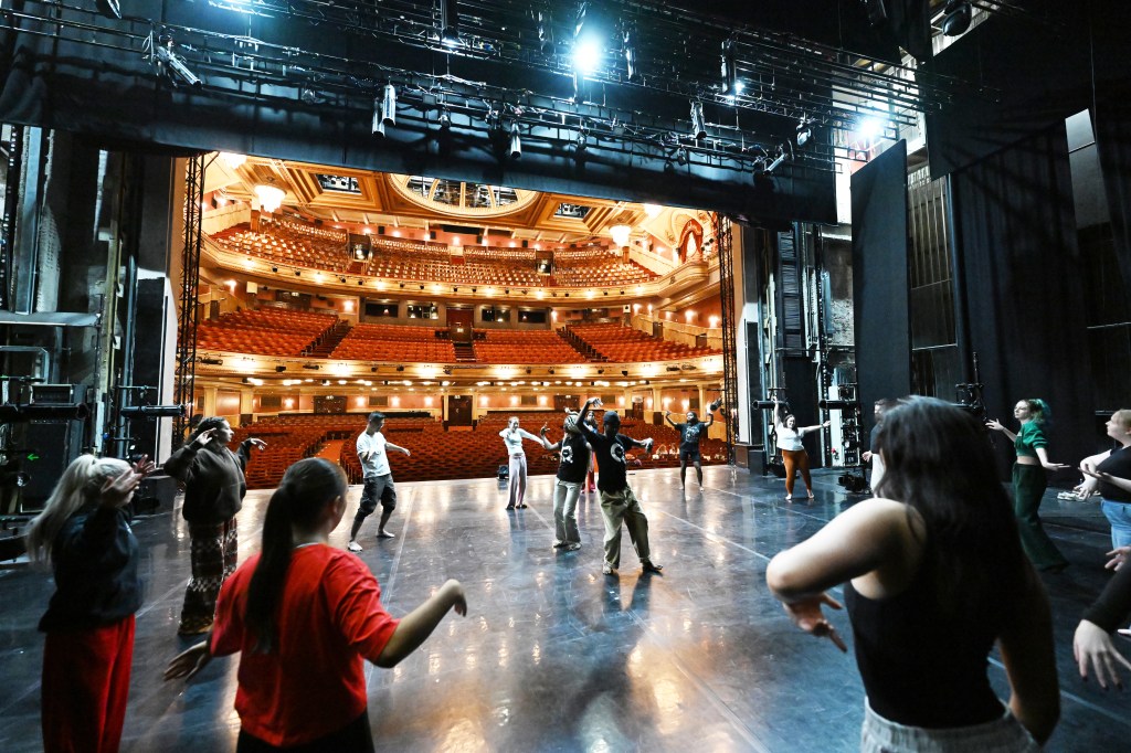 I dance with others on a stage