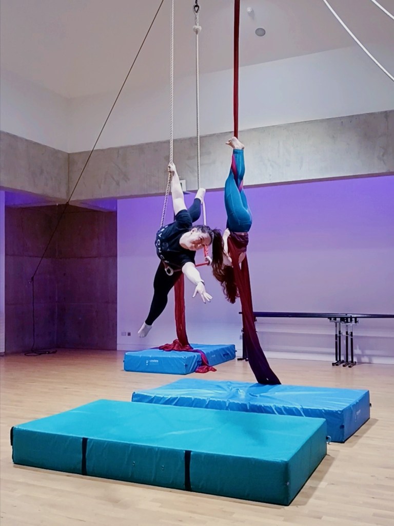 I hang diagonally on a trapeze