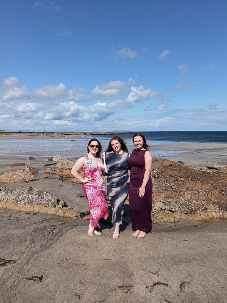 Hilary, Helen and I stand on the beach at Hazel's wedding