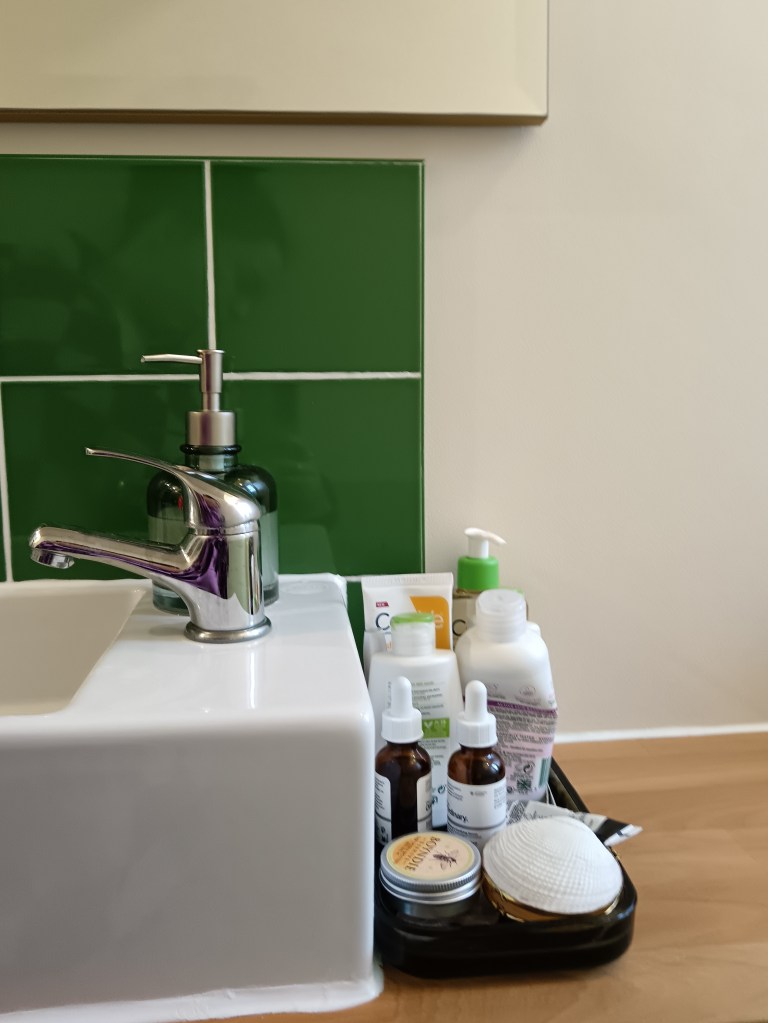 A detail shot of my little glass tray of skincare products