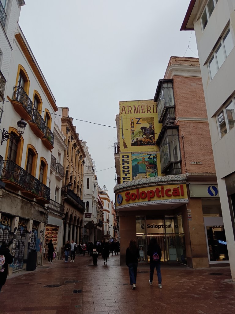 A cute street of white, yellow and orange painted buildings