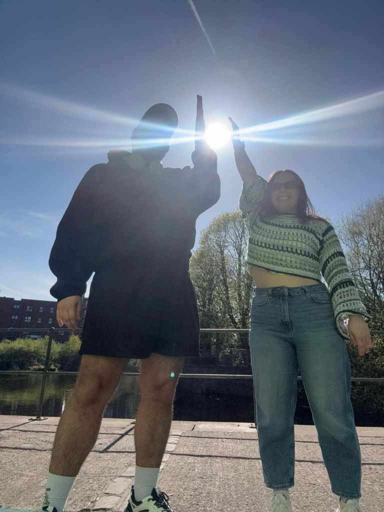 Bruno and I high five the sun