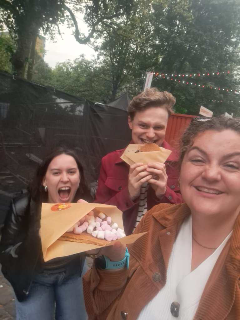 Laura, Jack and I smile and chomp on stroop waffles